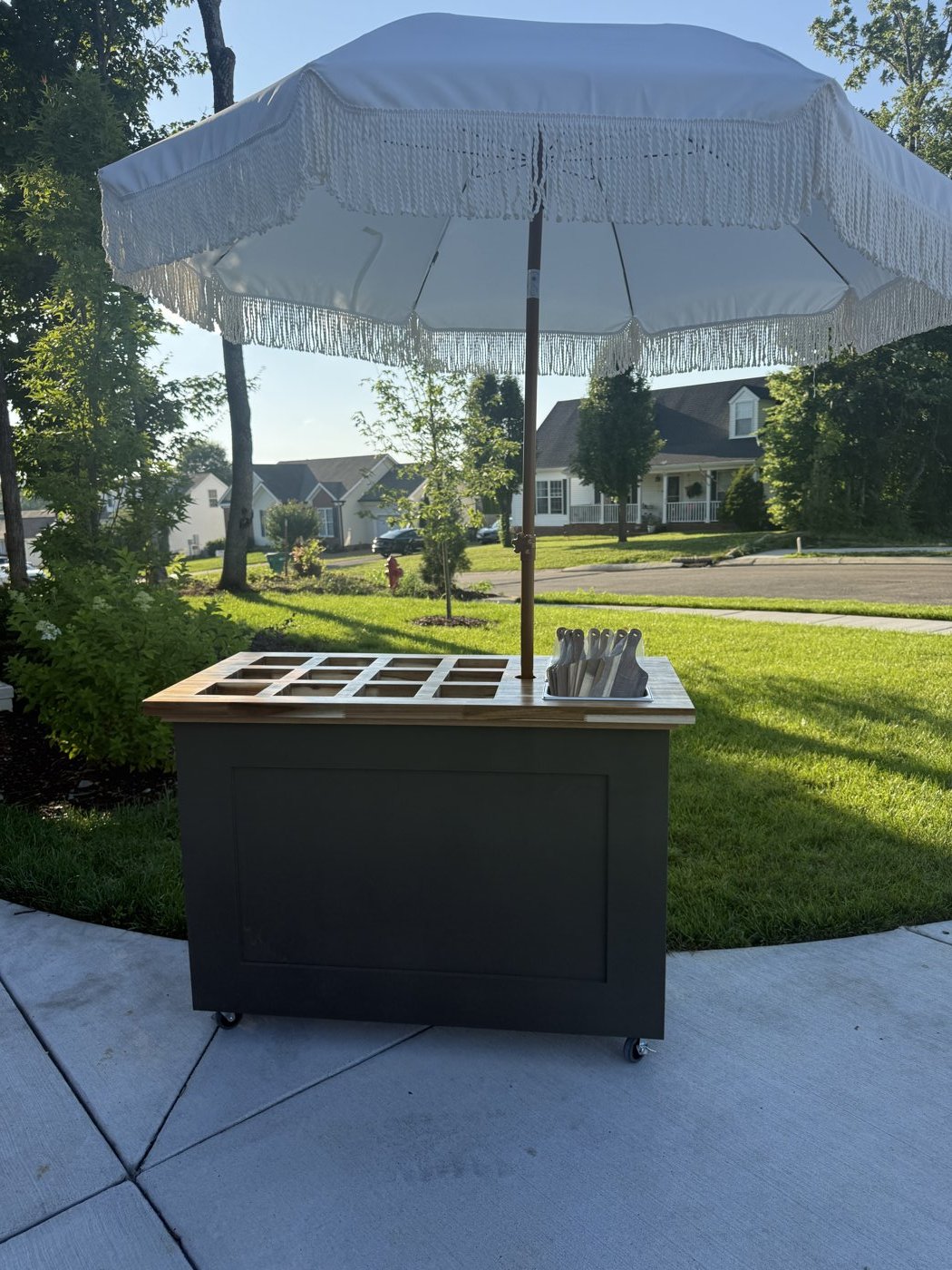 The Grazing Porch mobile charcuterie cart